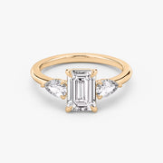 Emerald Cut - Plain Band - Three Stone Ring - 0.25 Ct Side Stone each - 18 K Gold
